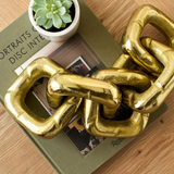 ESCULTURA CADENAS DORADAS